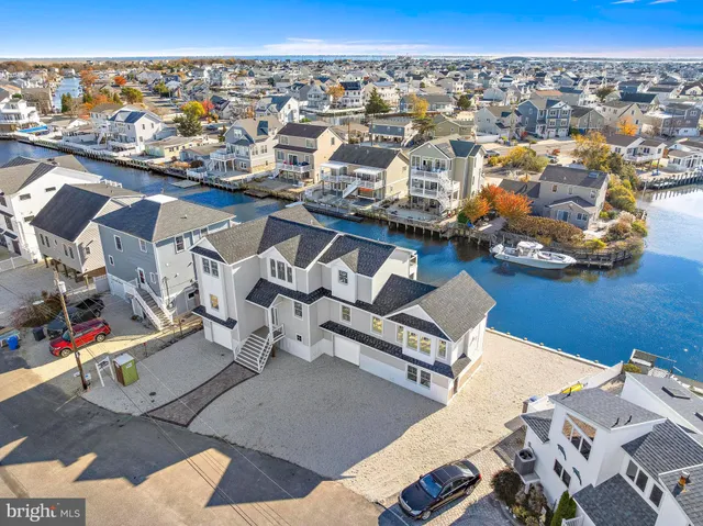 an aerial view of a house with a fireplace potted plants