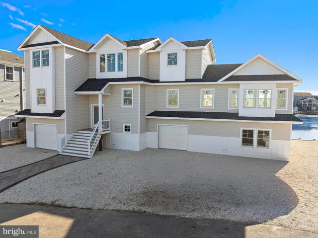 a view of multiple houses with a city street