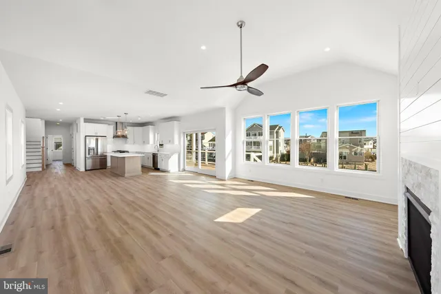 an aerial view of a house with a ocean view