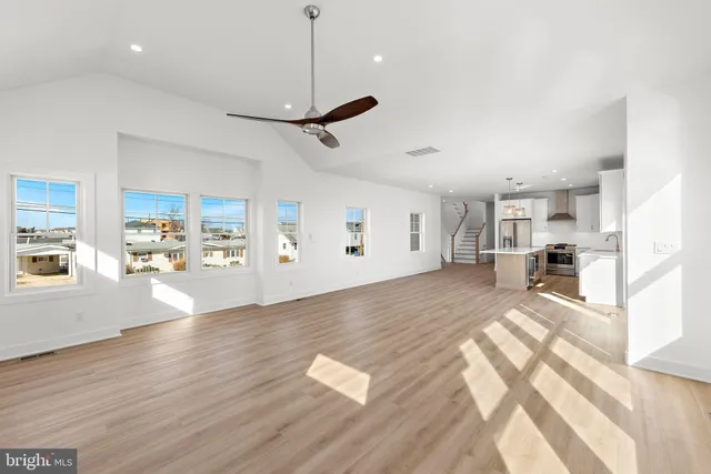 an aerial view of a house with a fireplace potted plants