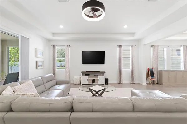 a kitchen with stainless steel appliances kitchen island granite countertop a sink and cabinets