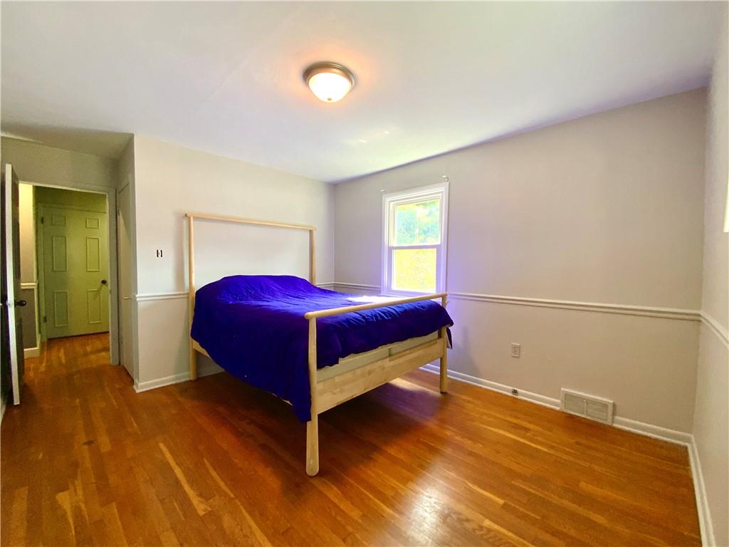 200 Chaplin Drive Coraopolis, PA 15108 - Photo 13 of 25 a bedroom with a bed and a window