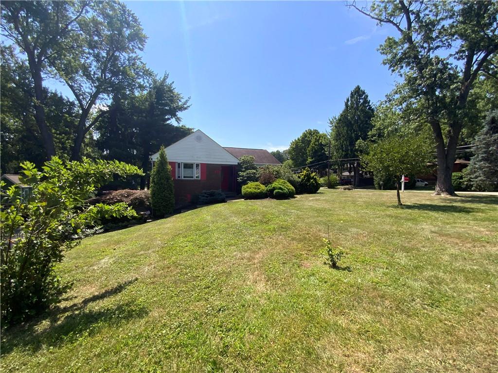 200 Chaplin Drive Coraopolis, PA 15108 - Photo 2 of 25 a view of a large garden with large trees