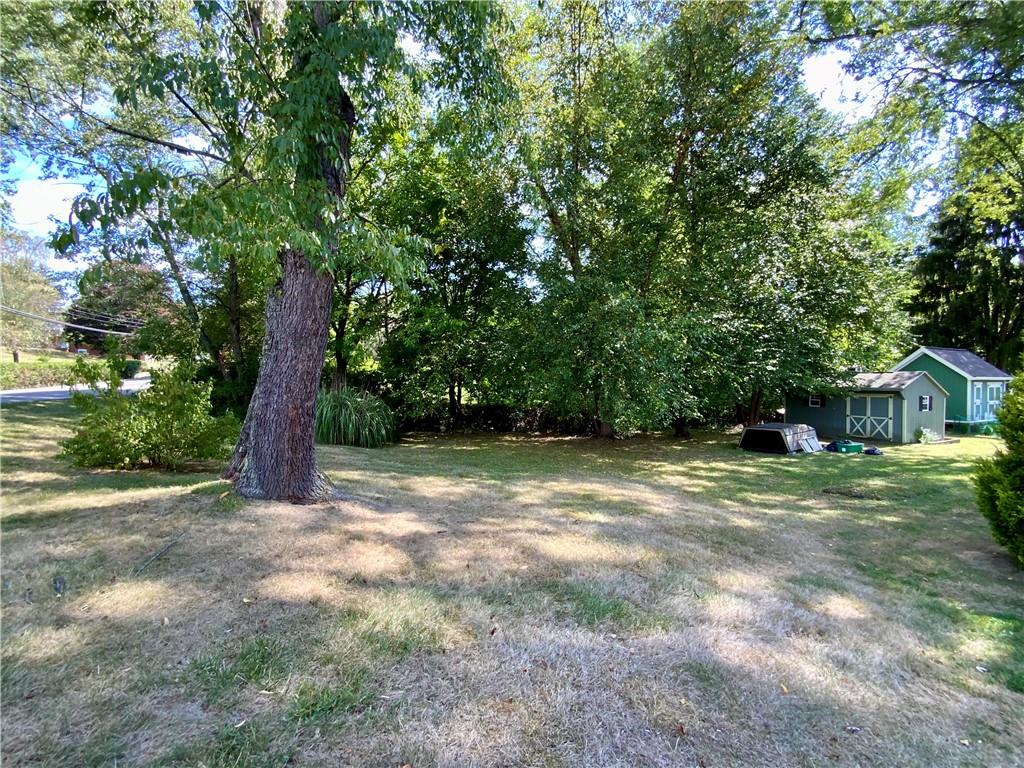 200 Chaplin Drive Coraopolis, PA 15108 - Photo 22 of 25 a view of a house with a tree in a yard