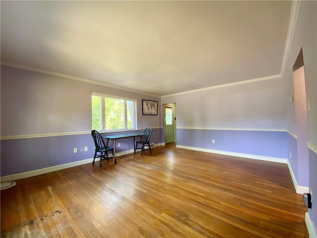 200 Chaplin Drive Coraopolis, PA 15108 - Photo 4 of 25 a living room with furniture and a window