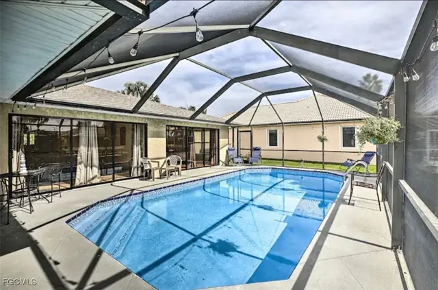 a view of indoor pool and sitting area