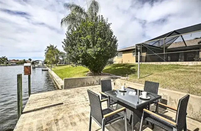 a view of a chairs and table on the terrace