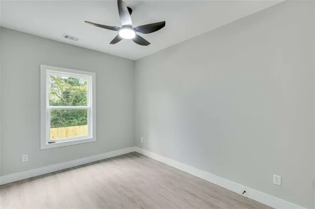 a view of backyard with green space