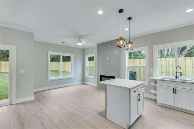 a view of an empty room with a window