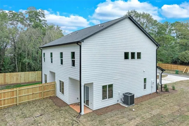 a view of backyard with green space