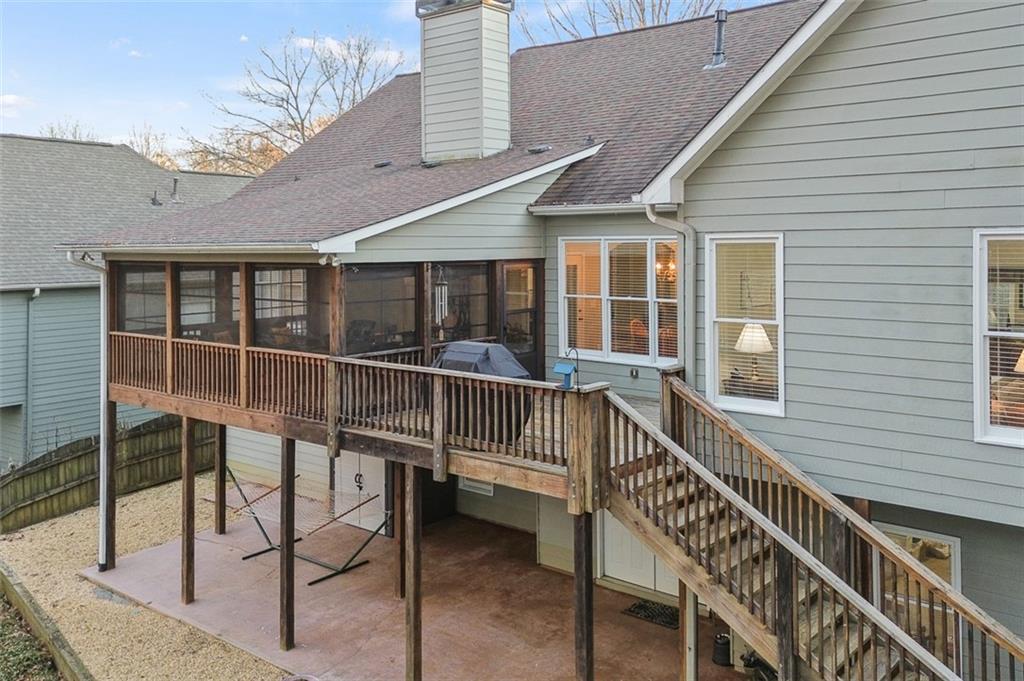 352 Woodbrook Crest Canton, GA 30114 - Photo 41 of 53 a view of a house with a wooden deck