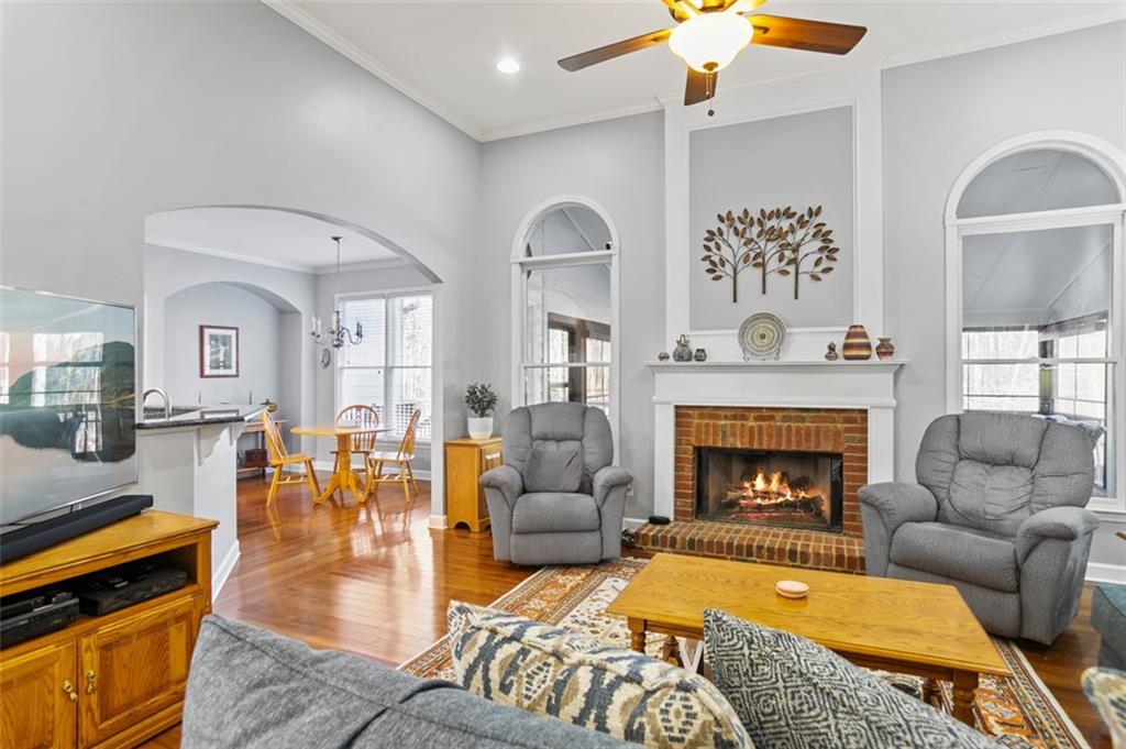 352 Woodbrook Crest Canton, GA 30114 - Photo 8 of 53 a living room with furniture fireplace and window
