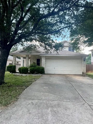 front view of a house with a street
