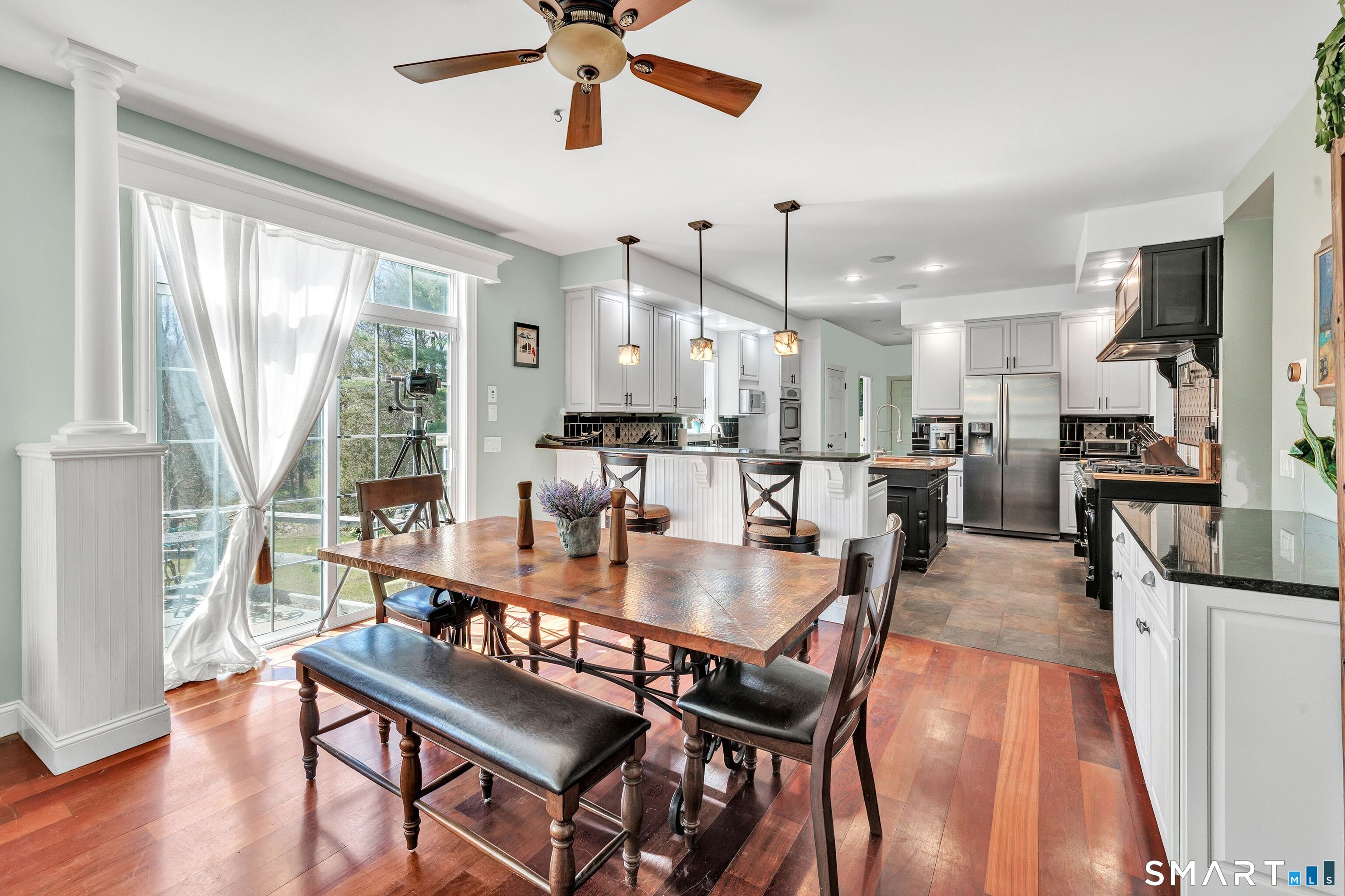 25 Starrs Ridge Road Redding, CT 06896 - Photo 12 of 38 Dining area with sliding glass doors, provides direct access to the rear patio.