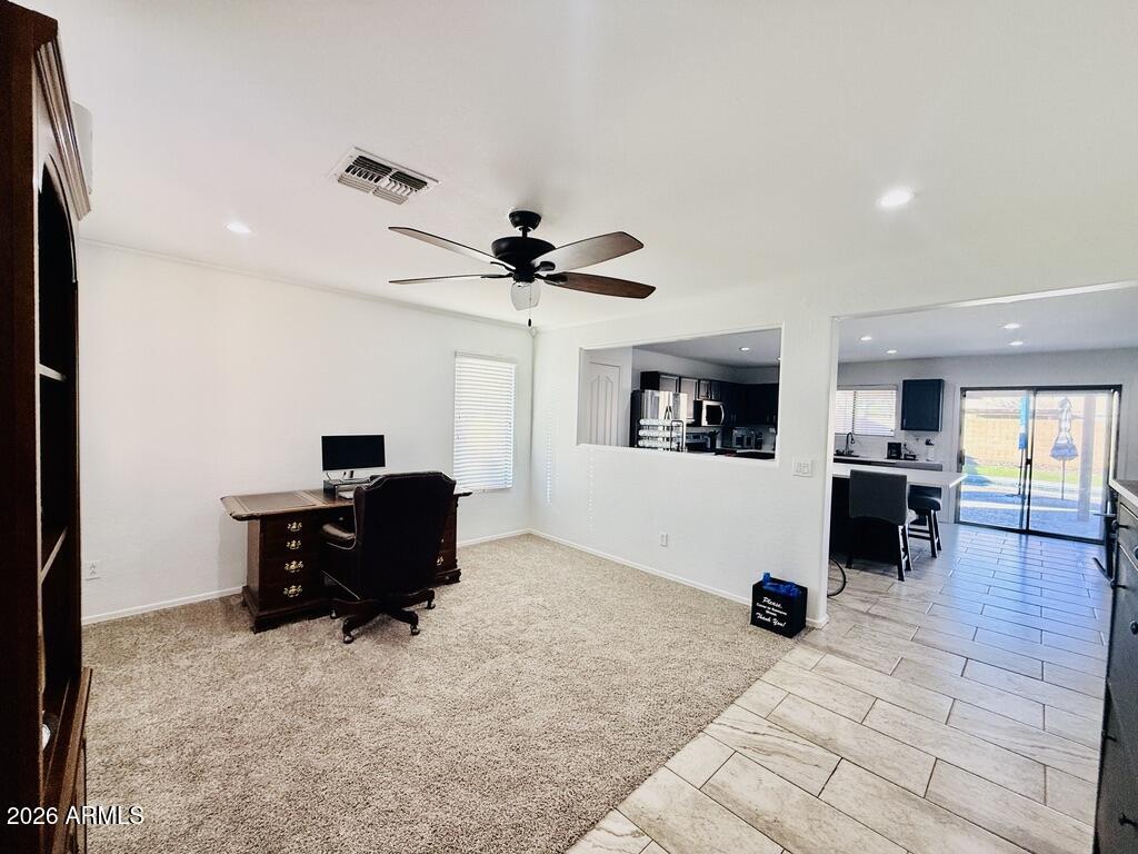 16246 West Boca Raton Road Surprise, AZ 85379 - Photo 14 of 27 a living room with furniture