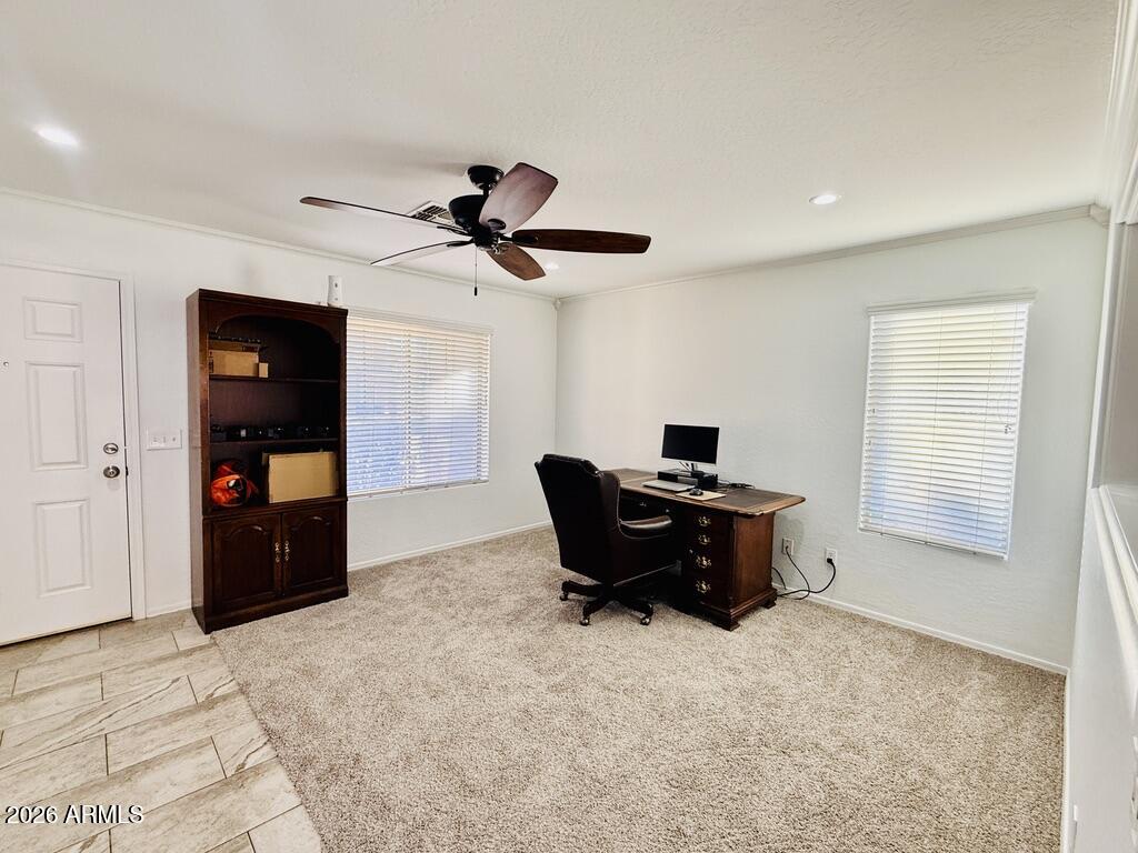 16246 West Boca Raton Road Surprise, AZ 85379 - Photo 15 of 27 a living room with furniture and a window