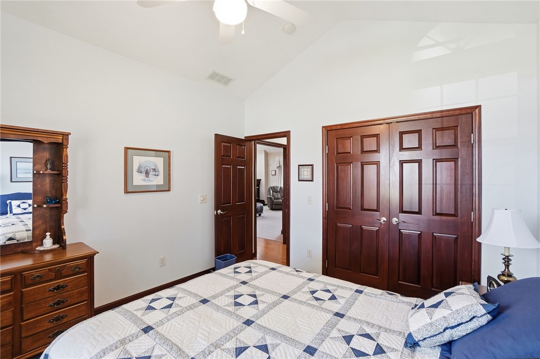 710 Governors Road Troy, OH 45373 - Photo 26 of 56 This spacious bedroom features ample closet space and a vaulted ceiling for an open feel.