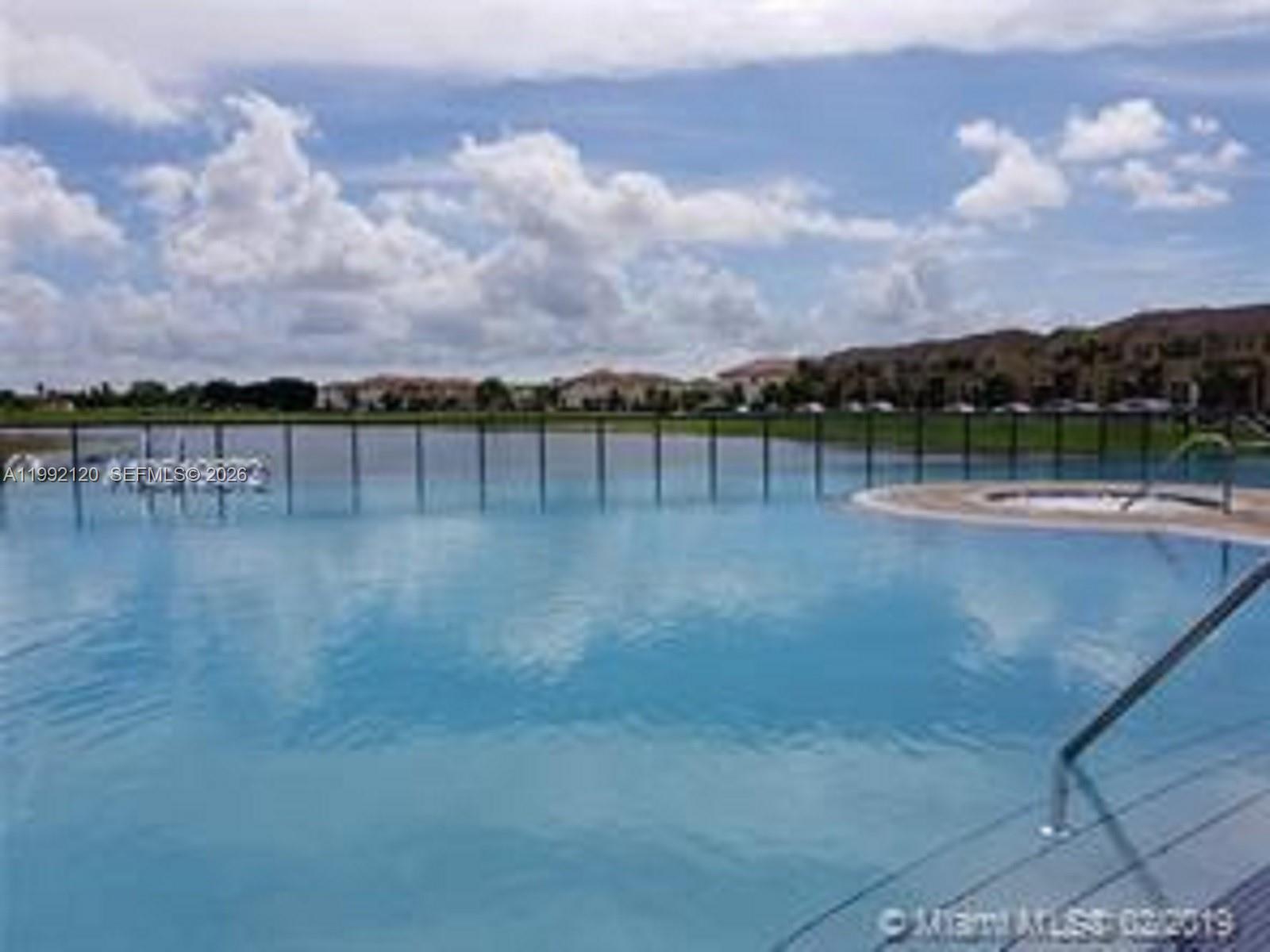 17000 Southwest 90th Terrace Miami, FL 33196 - Photo 47 of 56 a view of a lake with a city
