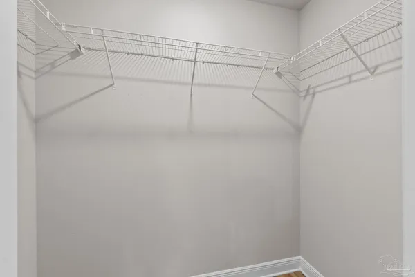 a view of a room with racks on the wall