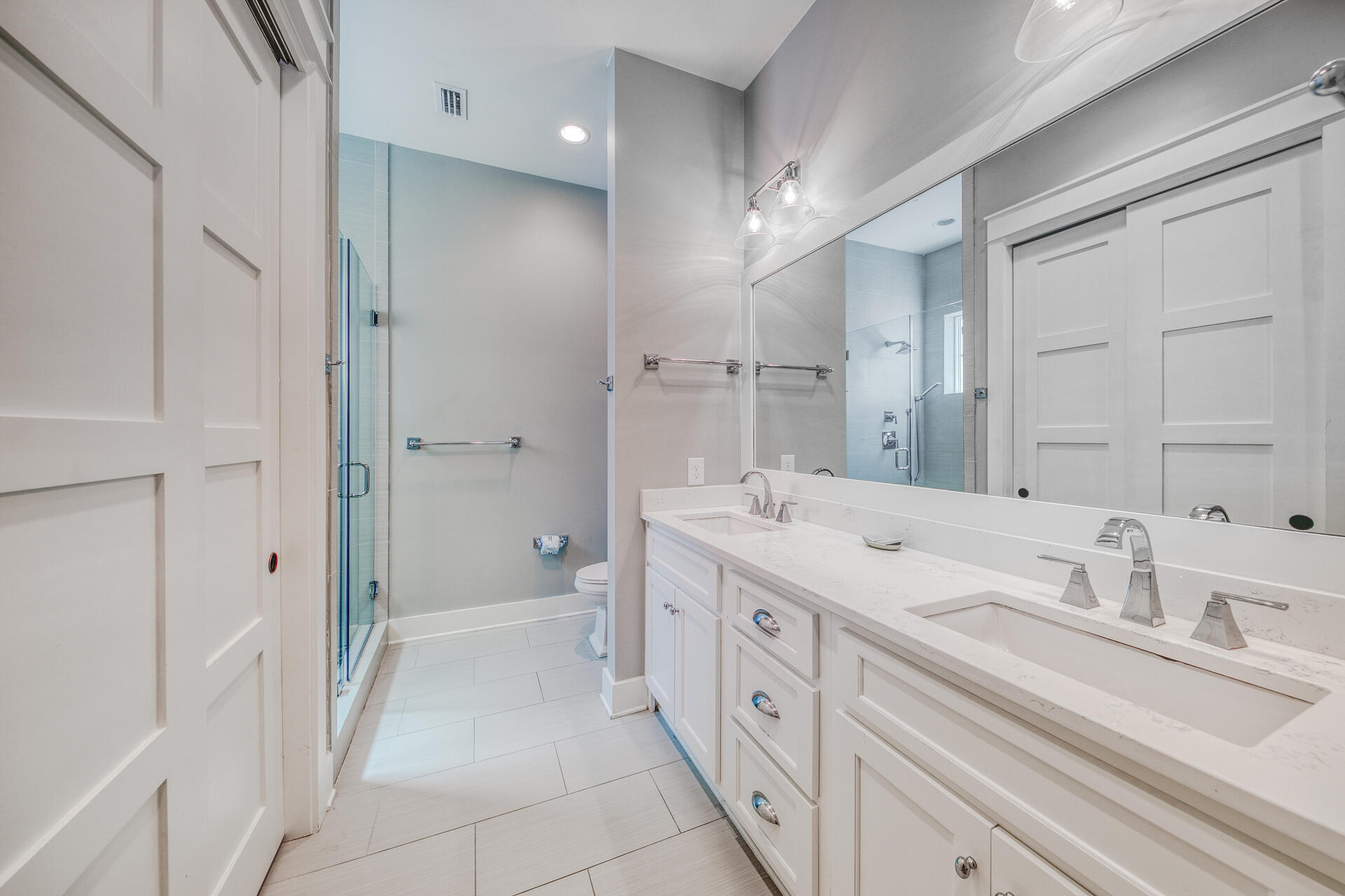 21 Beachcomber Ln Inlet Beach Inlet Beach, FL 32461 - Photo 18 of 60 a spacious bathroom with a double vanity sink mirror double and shower