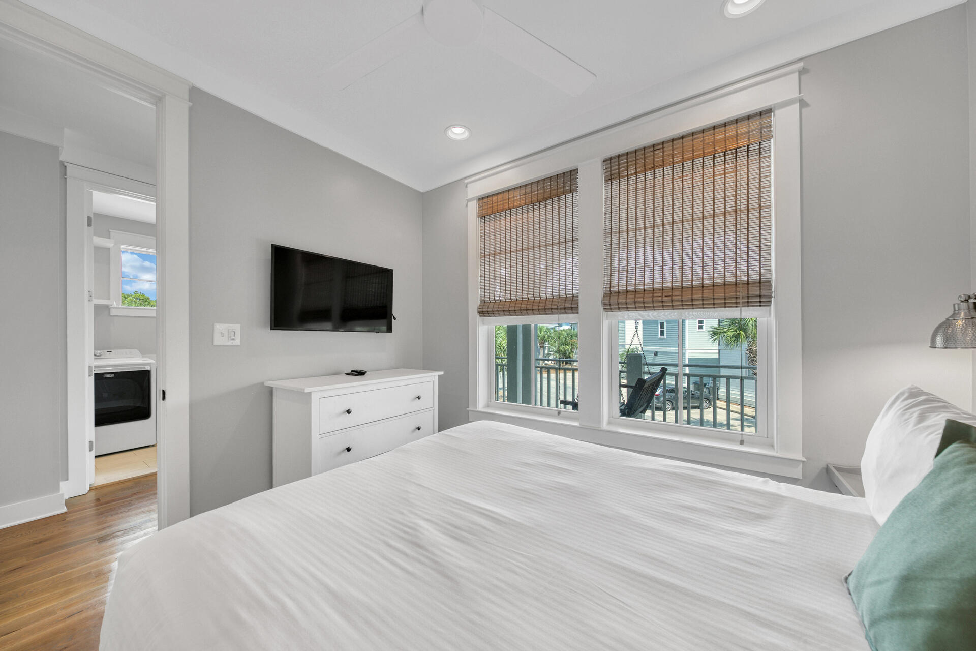 21 Beachcomber Ln Inlet Beach Inlet Beach, FL 32461 - Photo 22 of 60 a large bedroom with a large bed and a flat tv screen on dresser