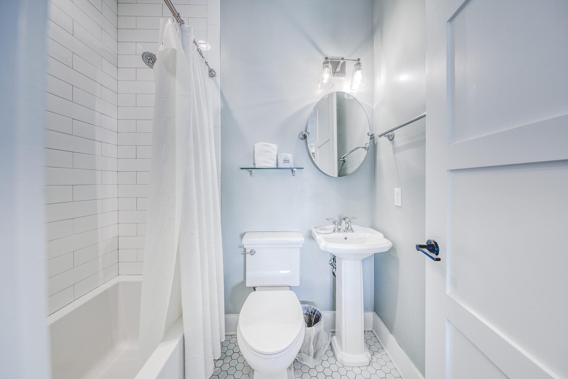 21 Beachcomber Ln Inlet Beach Inlet Beach, FL 32461 - Photo 23 of 60 a bathroom with a sink a toilet and shower