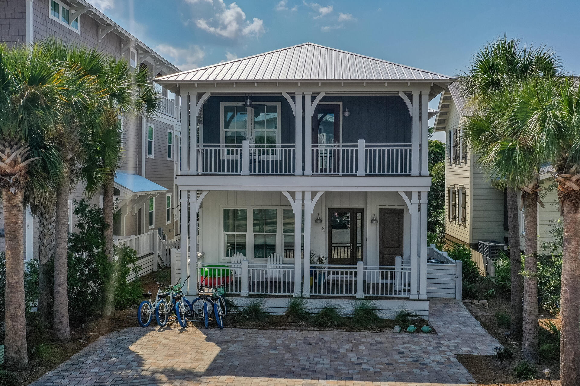 21 Beachcomber Ln Inlet Beach Inlet Beach, FL 32461 - Photo 46 of 60 a view of a brick house with plants and large tree