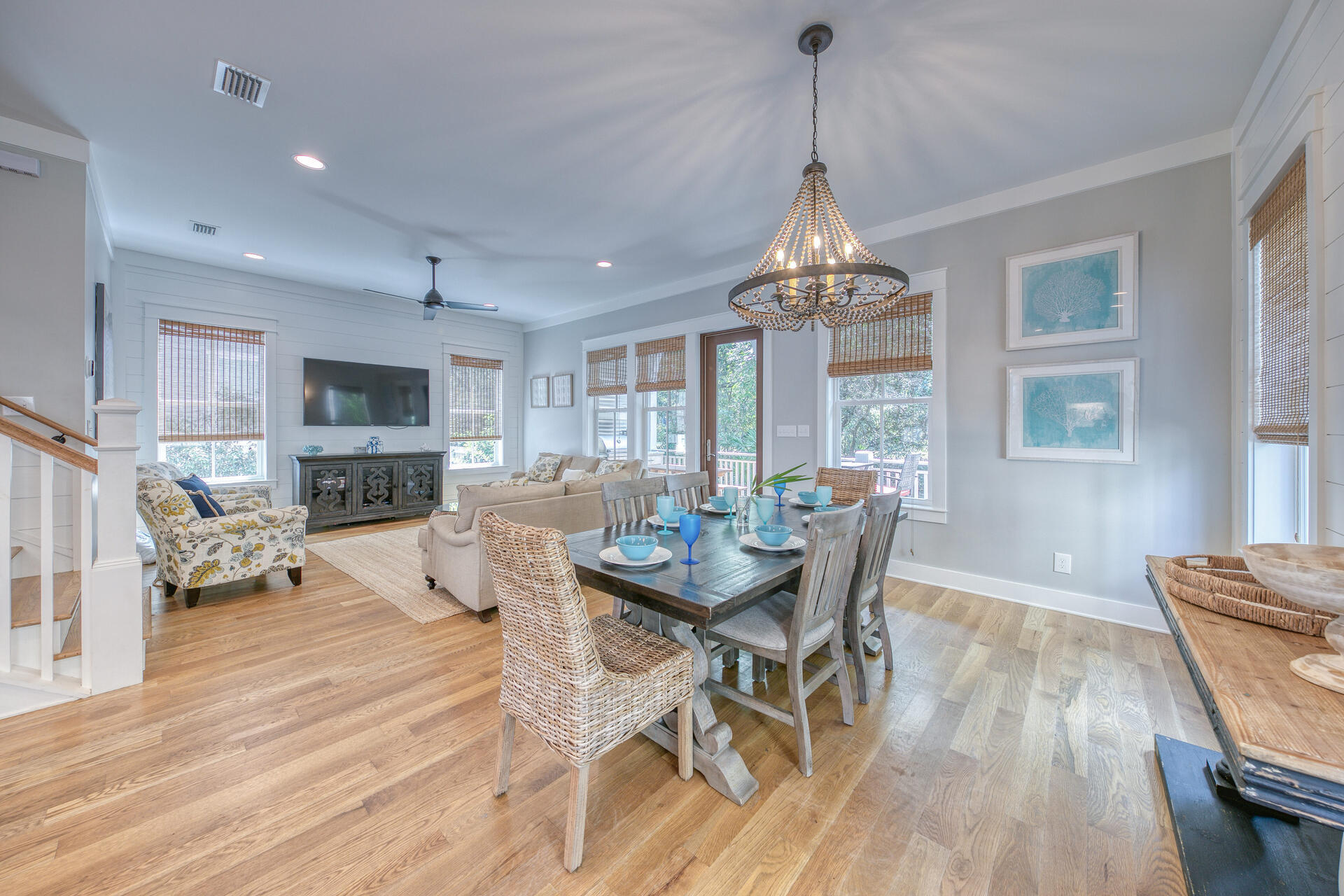 21 Beachcomber Ln Inlet Beach Inlet Beach, FL 32461 - Photo 5 of 60 a dining room with furniture a chandelier and wooden floor