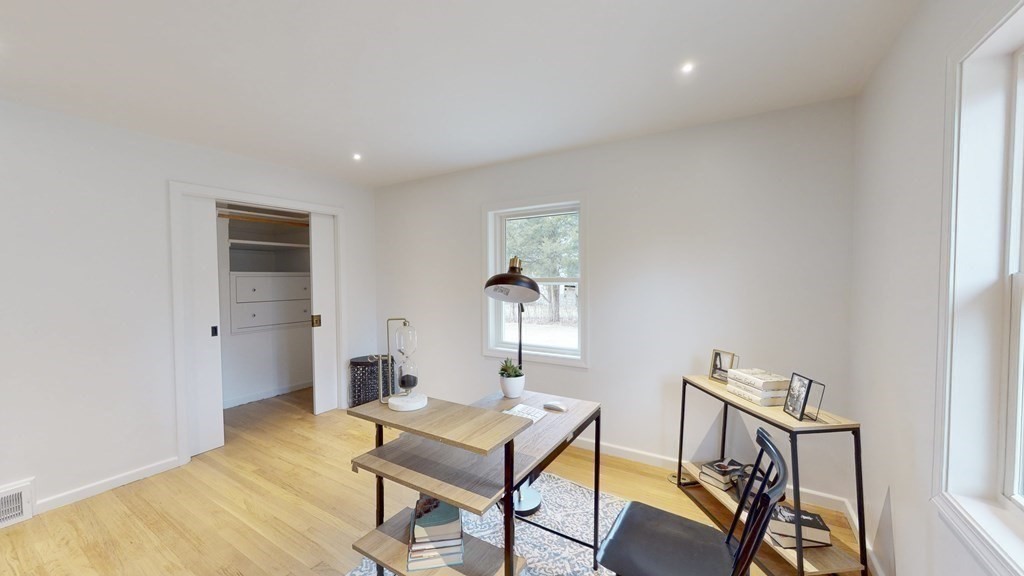4 Sunset Drive Walpole, MA 02081 - Photo 19 of 37 a workspace room with furniture and wooden floor