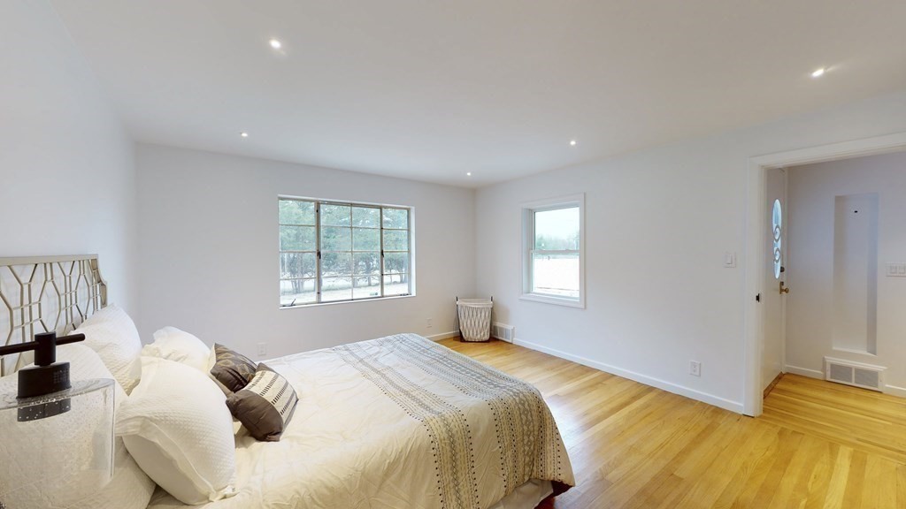 4 Sunset Drive Walpole, MA 02081 - Photo 21 of 37 a bedroom with a bed and a window