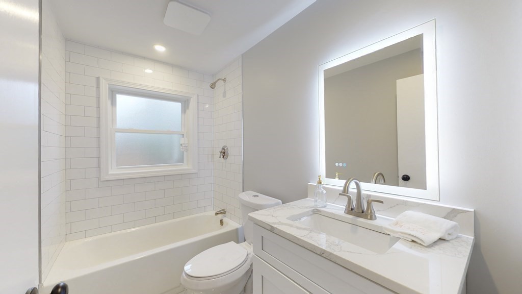 4 Sunset Drive Walpole, MA 02081 - Photo 22 of 37 a bathroom with a granite countertop sink toilet and shower