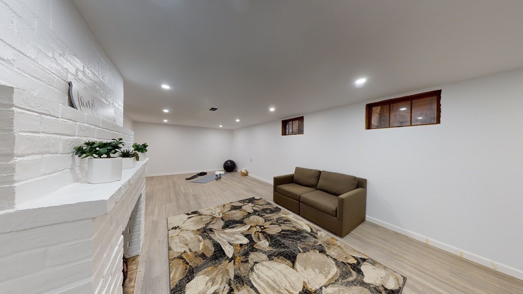 4 Sunset Drive Walpole, MA 02081 - Photo 28 of 37 a living room with furniture and flowers