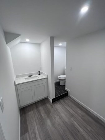 4 Sunset Drive Walpole, MA 02081 - Photo 33 of 37 a bathroom with a double vanity sink and mirror