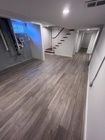 4 Sunset Drive Walpole, MA 02081 - Photo 34 of 37 a view of a room with wooden floor