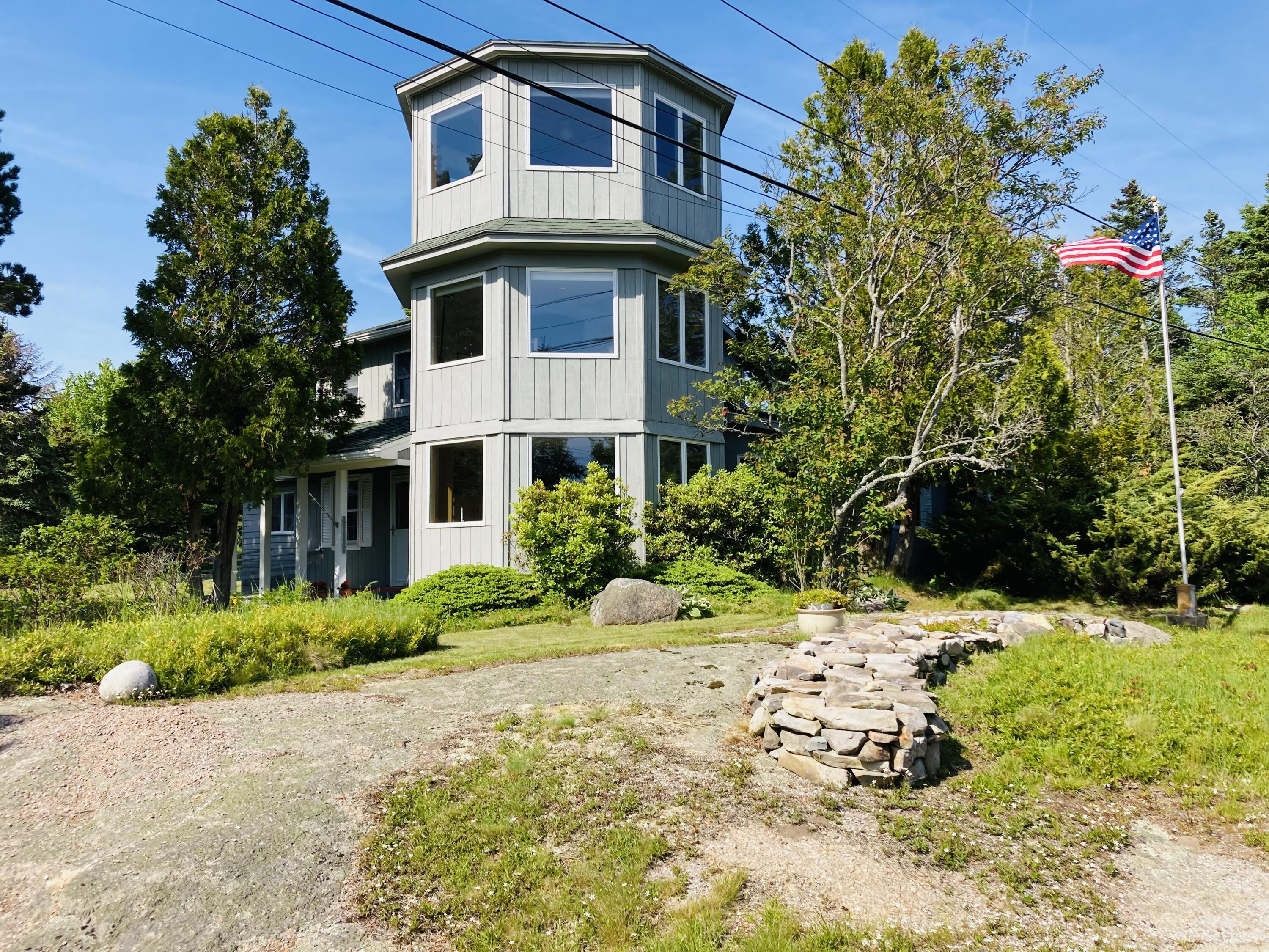 68 Crowley Island Road Corea, ME 04624 - Photo 6 of 24 Driveway approach with rock wall.