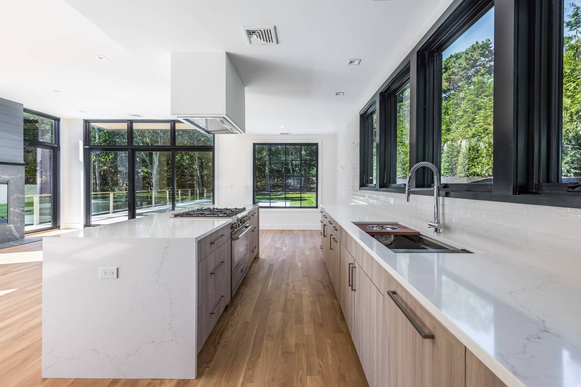 19 Peter's Path East Hampton, NY 11937 - Photo 15 of 29 a kitchen with a sink and large window