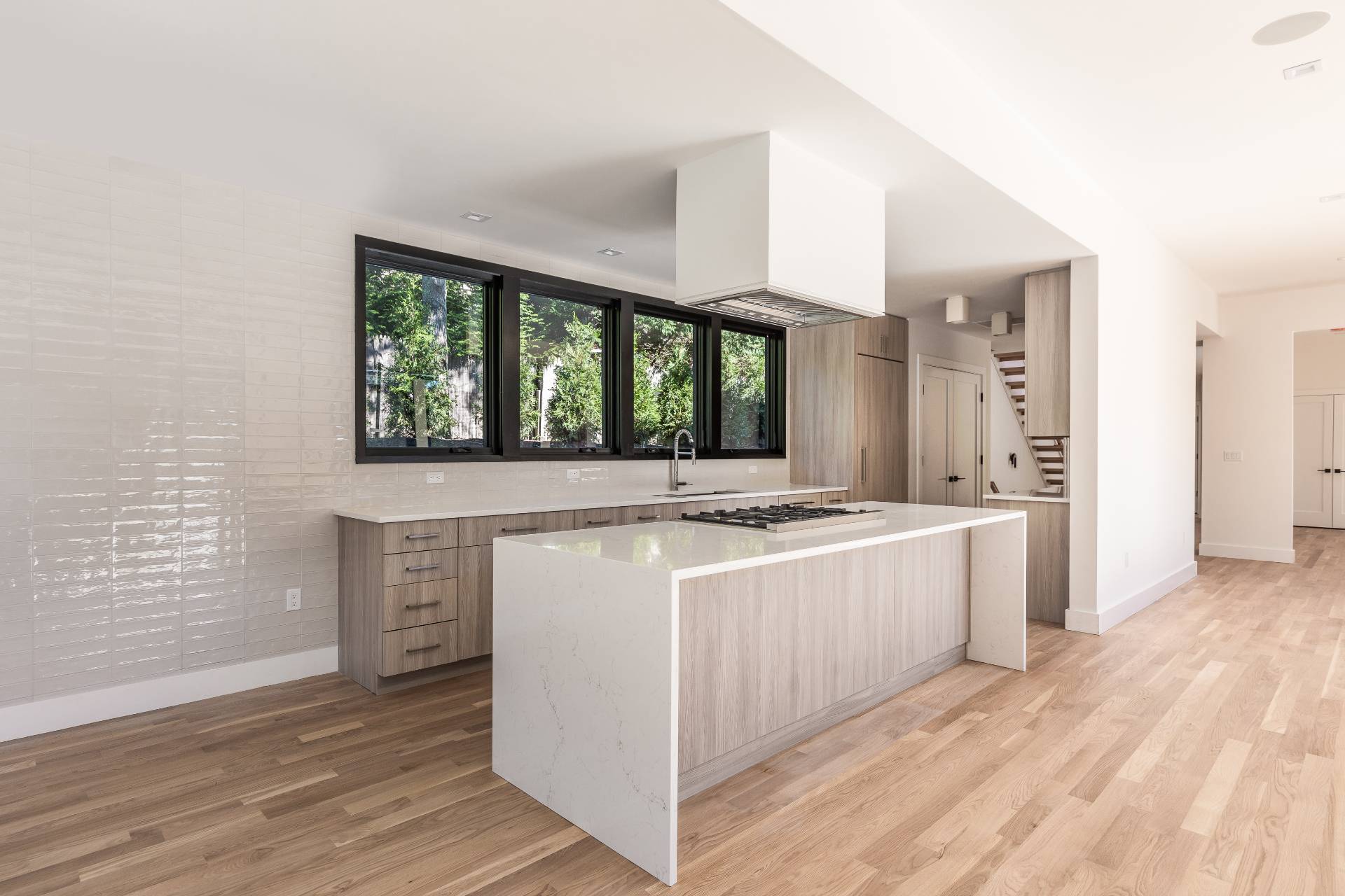 19 Peter's Path East Hampton, NY 11937 - Photo 17 of 29 a view of a kitchen with wooden floor and electronic appliances