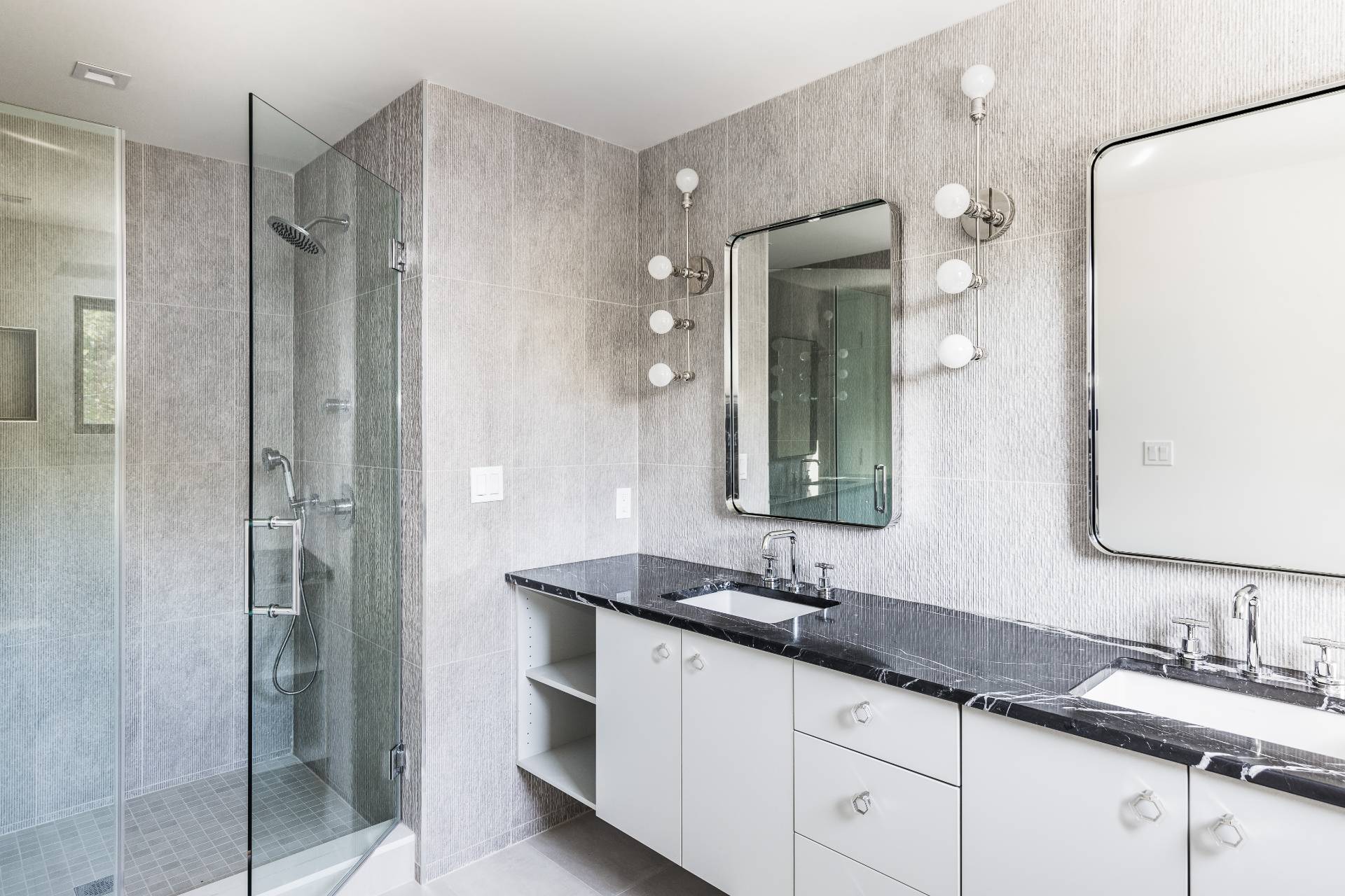 19 Peter's Path East Hampton, NY 11937 - Photo 20 of 29 a bathroom with a granite countertop sink and a mirror
