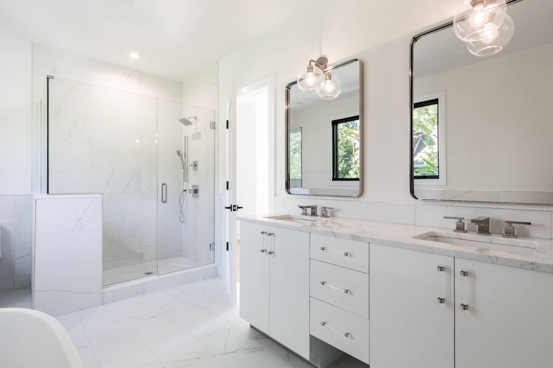 19 Peter's Path East Hampton, NY 11937 - Photo 22 of 29 a bathroom with a double vanity sink mirror double and shower