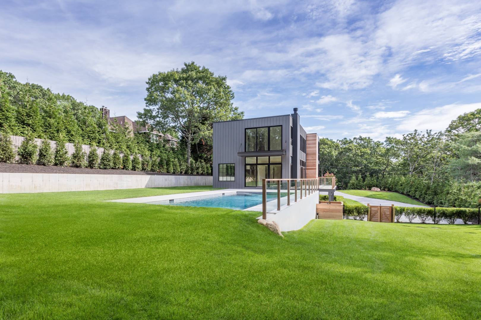 19 Peter's Path East Hampton, NY 11937 - Photo 28 of 29 a view of a house with a backyard porch and sitting area