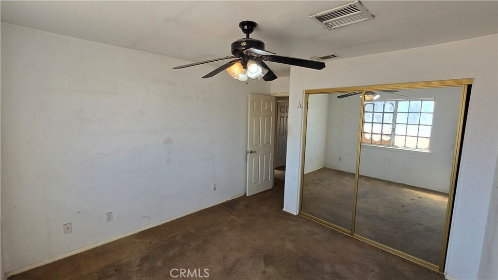 14280 Navajo Road Apple Valley, CA 92307 - Photo 13 of 28 a view of empty room with window