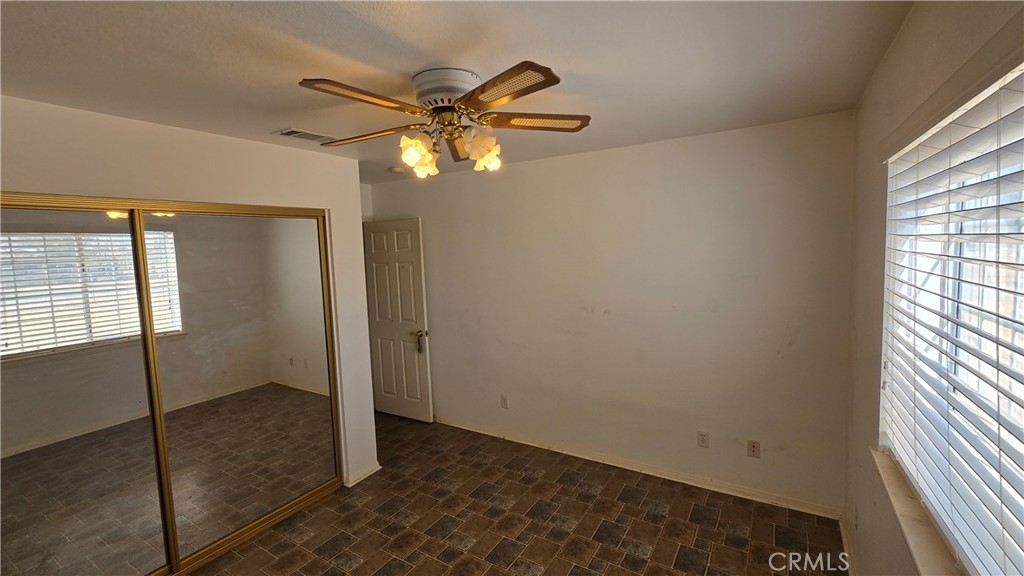 14280 Navajo Road Apple Valley, CA 92307 - Photo 15 of 28 a view of an empty room and window