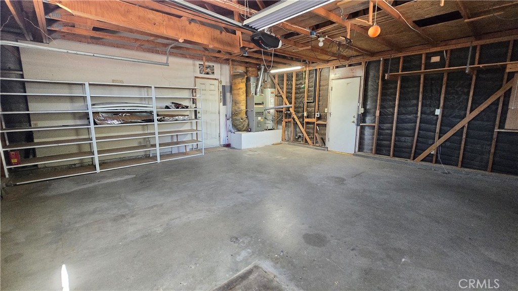 14280 Navajo Road Apple Valley, CA 92307 - Photo 24 of 28 a view of an empty room with storage