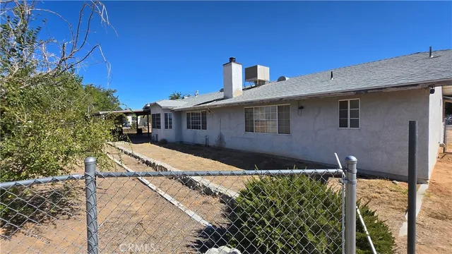 a front view of a house with yard