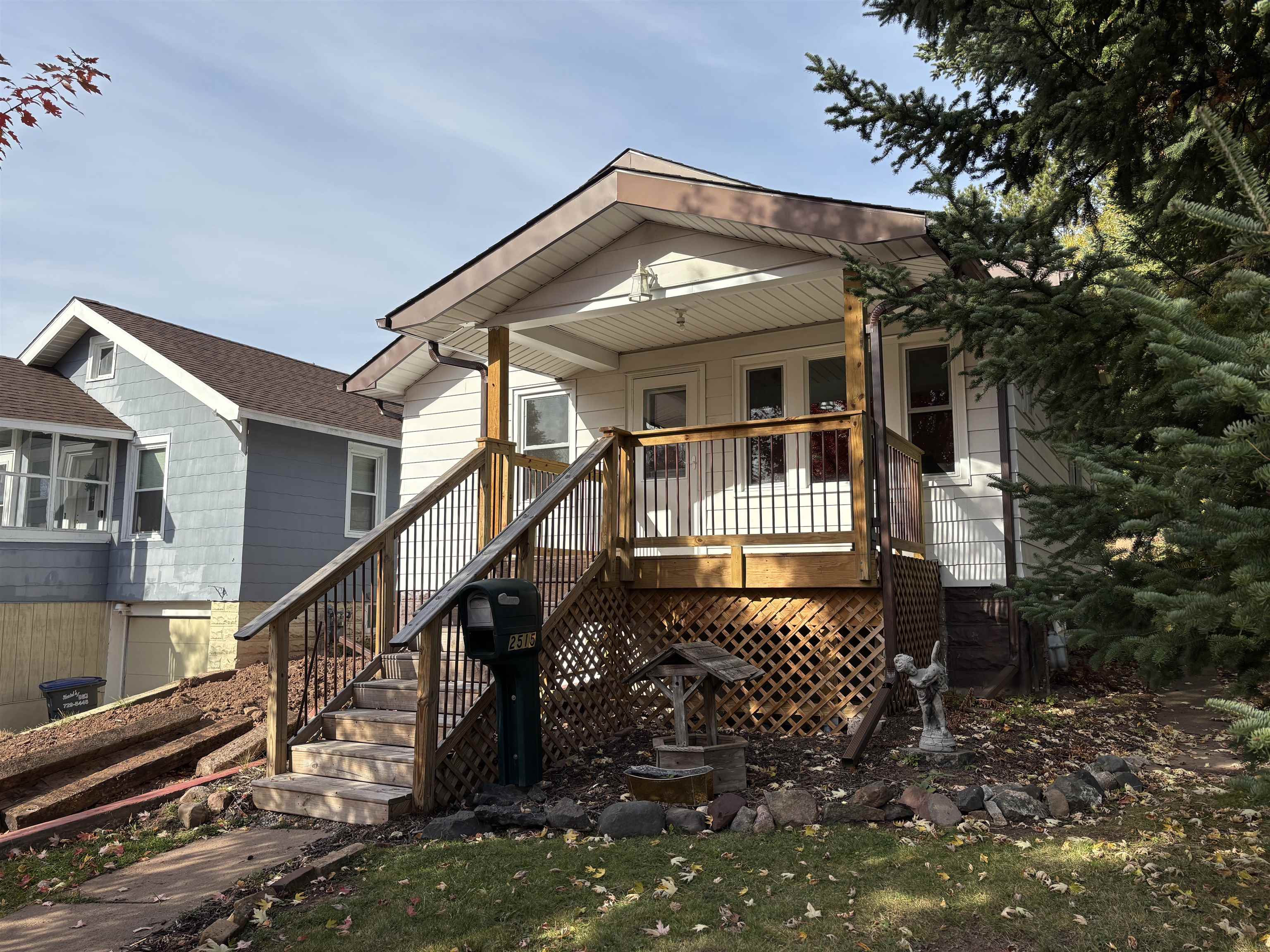 2515 Jefferson Street Duluth, MN 55812 - Photo 1 of 25 Rear view of house featuring stairway and roof with shingles
