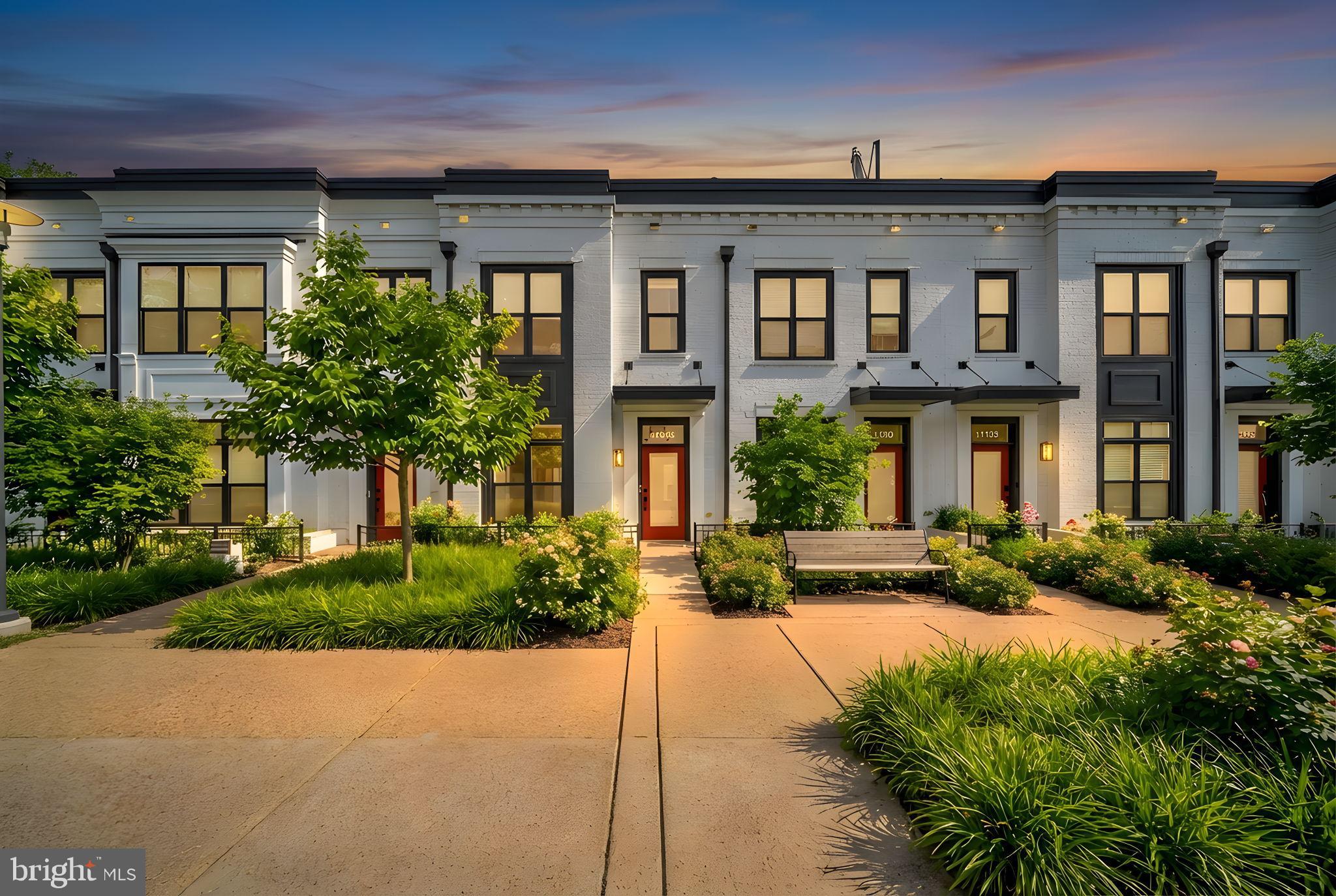 11326 Emerald Park Road Potomac, MD 20854 - Photo 2 of 40 a front view of a brick house with a yard