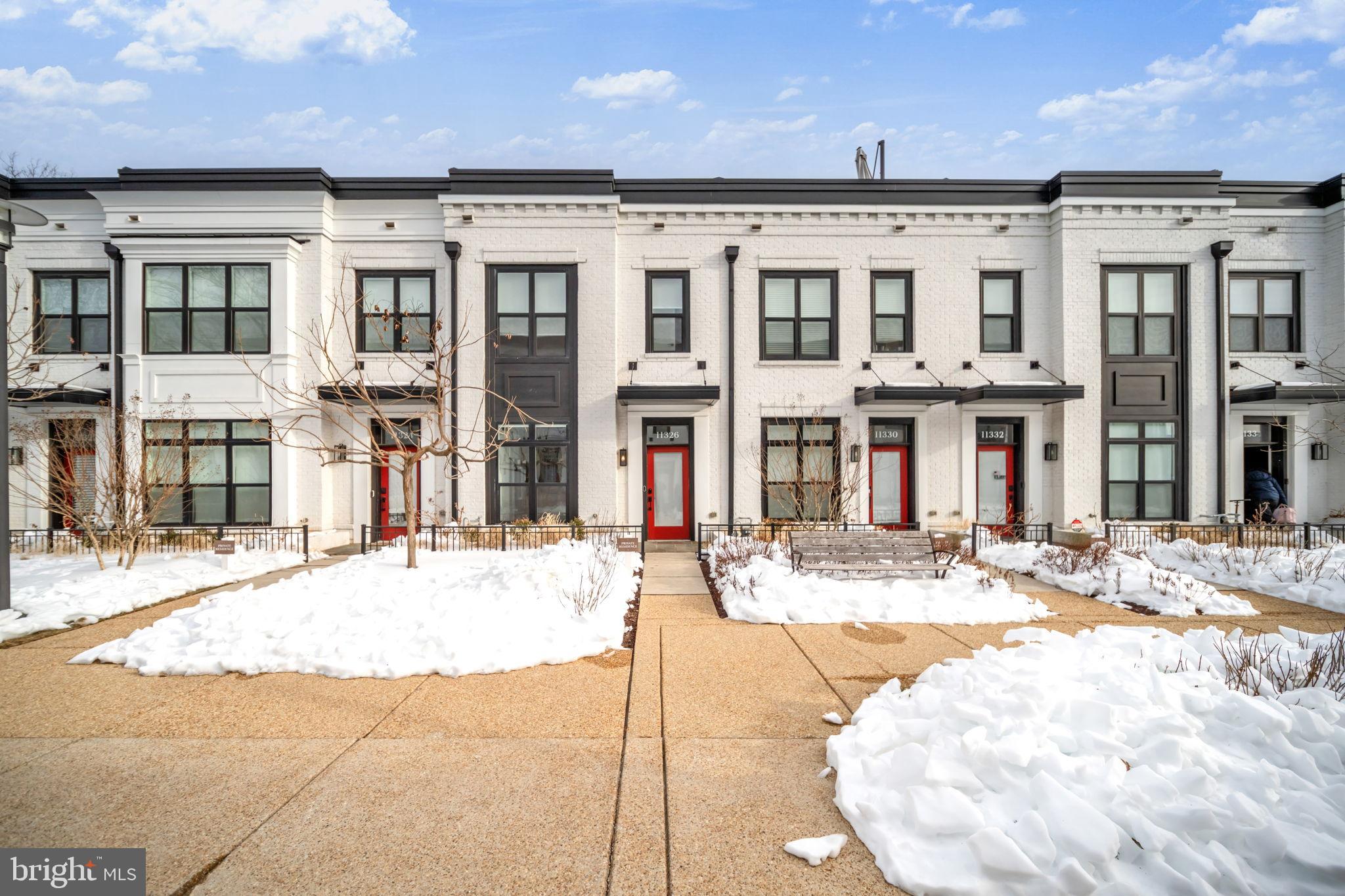 11326 Emerald Park Road Potomac, MD 20854 - Photo 3 of 40 a front view of a building with street