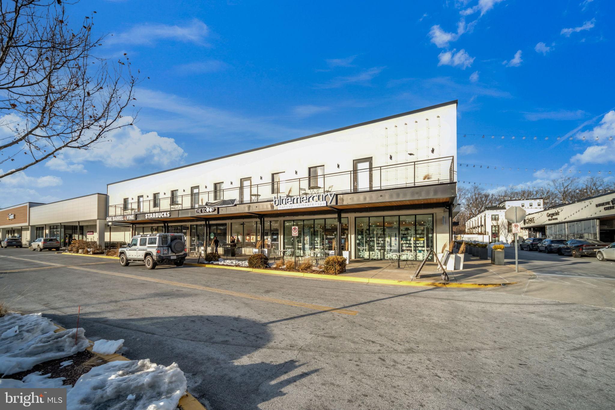 11326 Emerald Park Road Potomac, MD 20854 - Photo 34 of 40 a front view of a building with street view