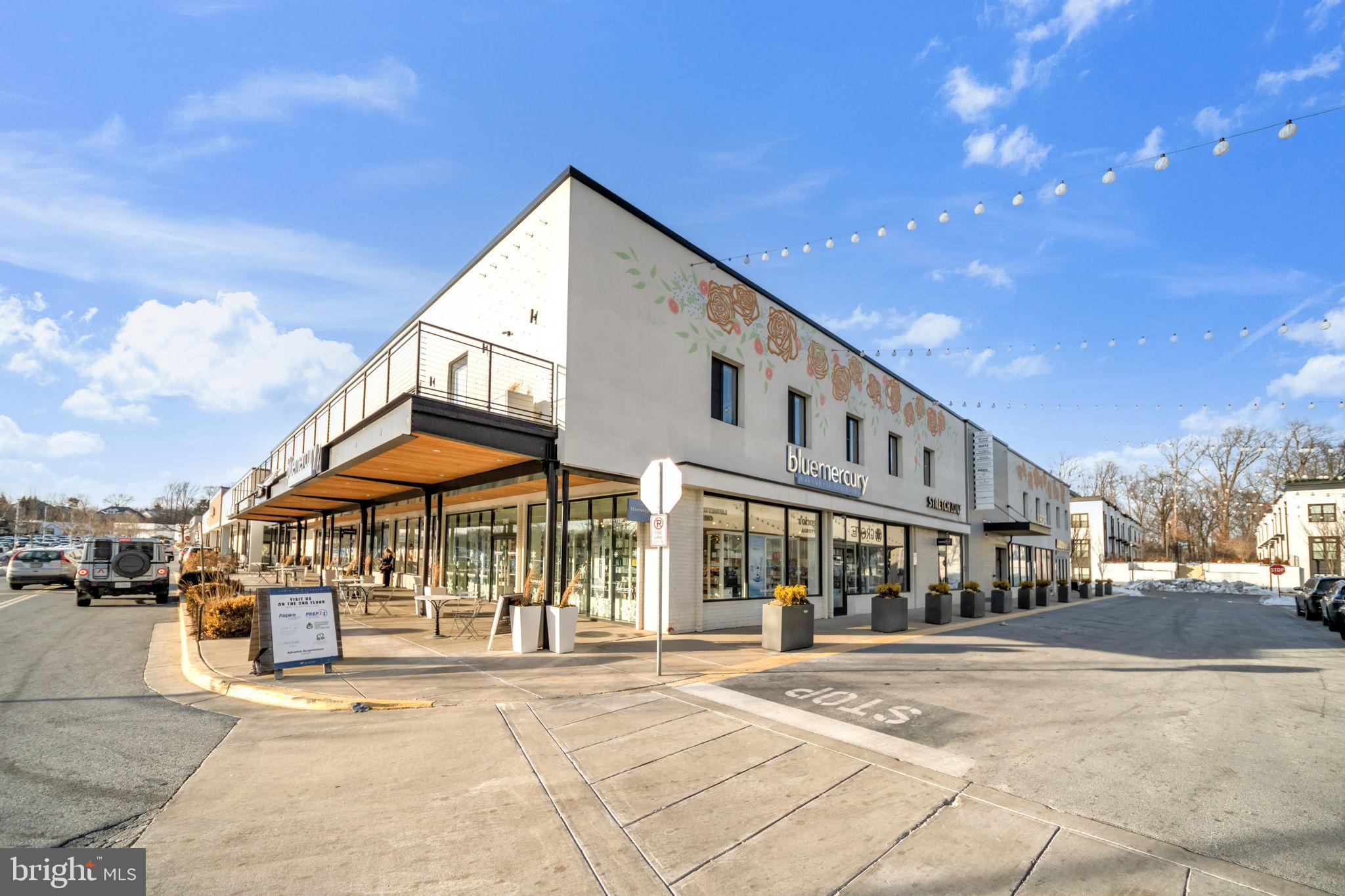 11326 Emerald Park Road Potomac, MD 20854 - Photo 35 of 40 a view of large building with a street