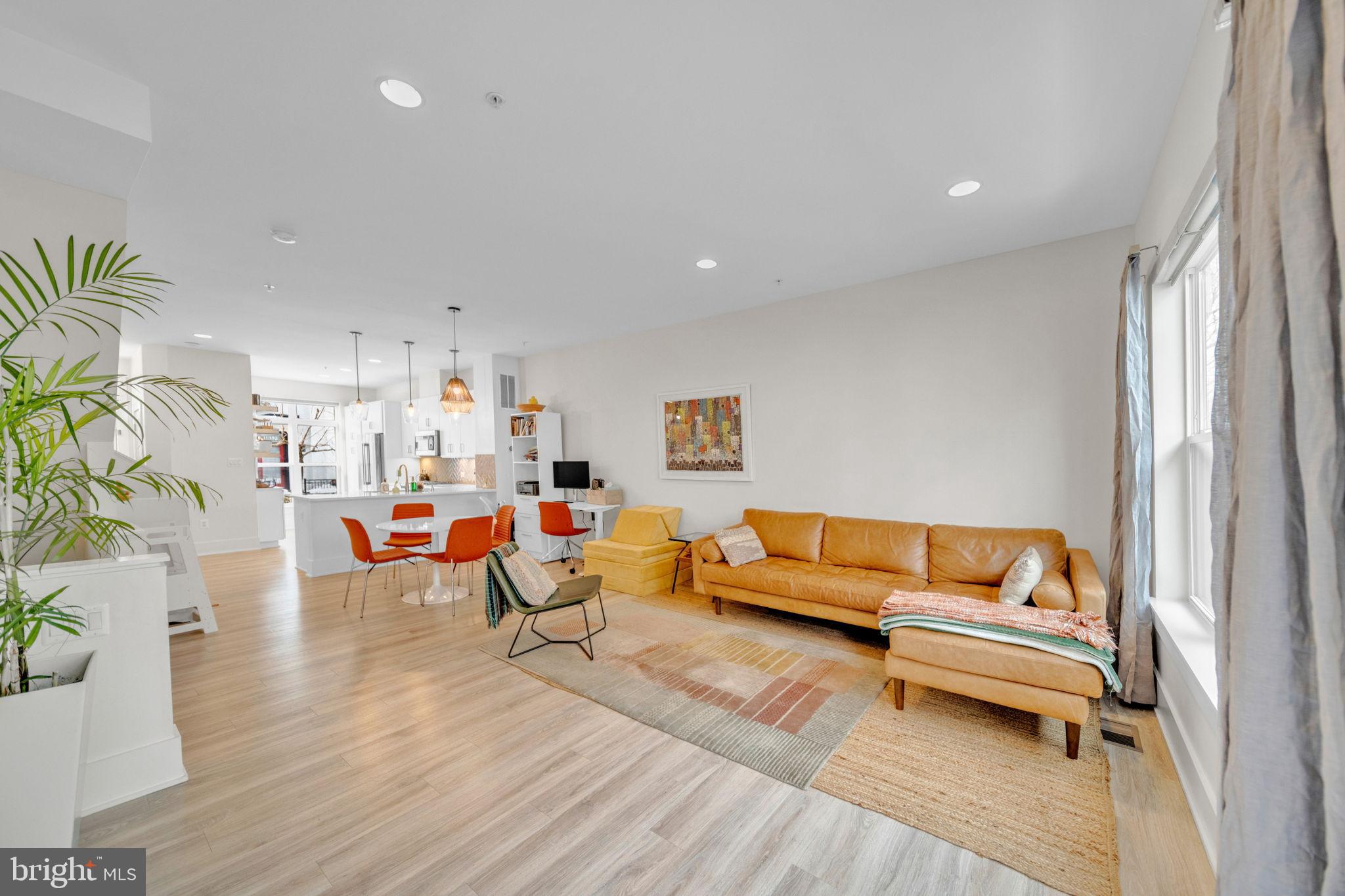11326 Emerald Park Road Potomac, MD 20854 - Photo 5 of 40 a living room with furniture and a couch